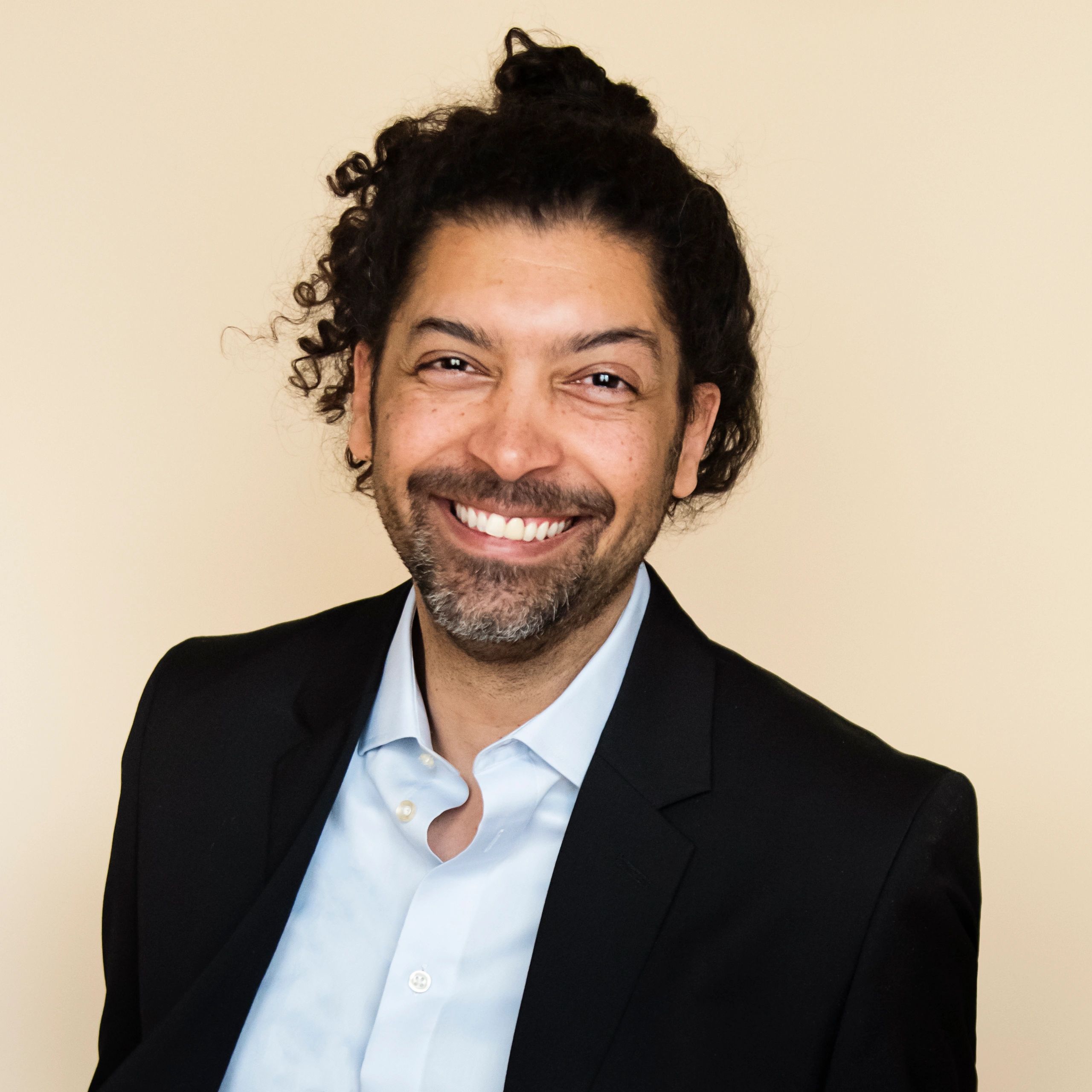 Professional headshot representing carrier support specialist