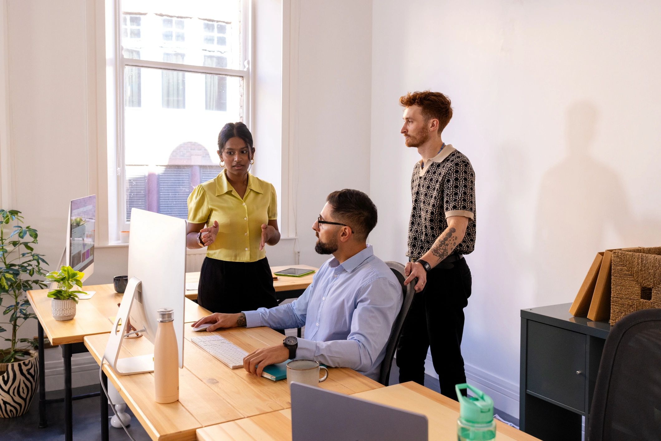 Professional logistics team collaborating in an office