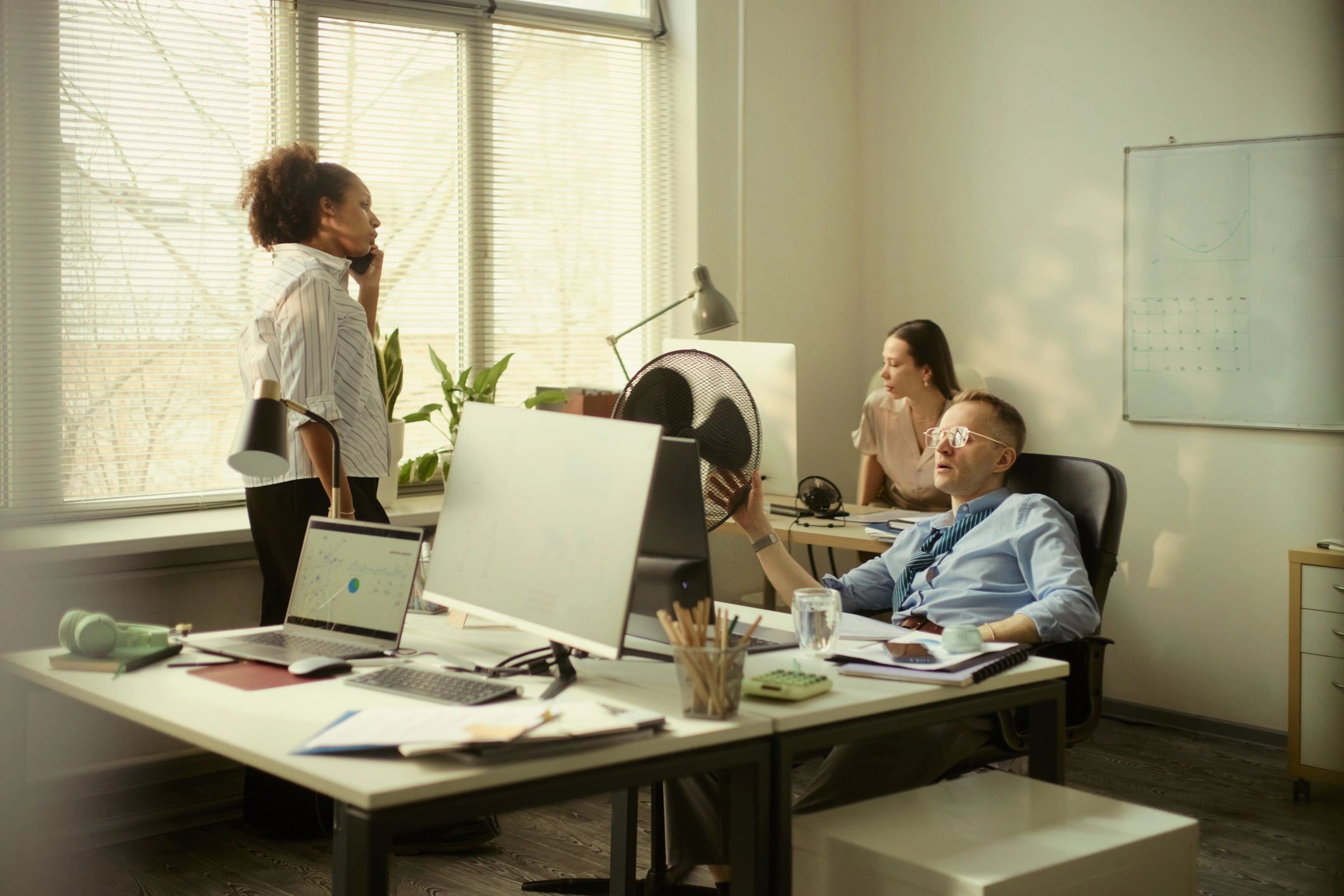 Office team collaborating on daily logistics operations